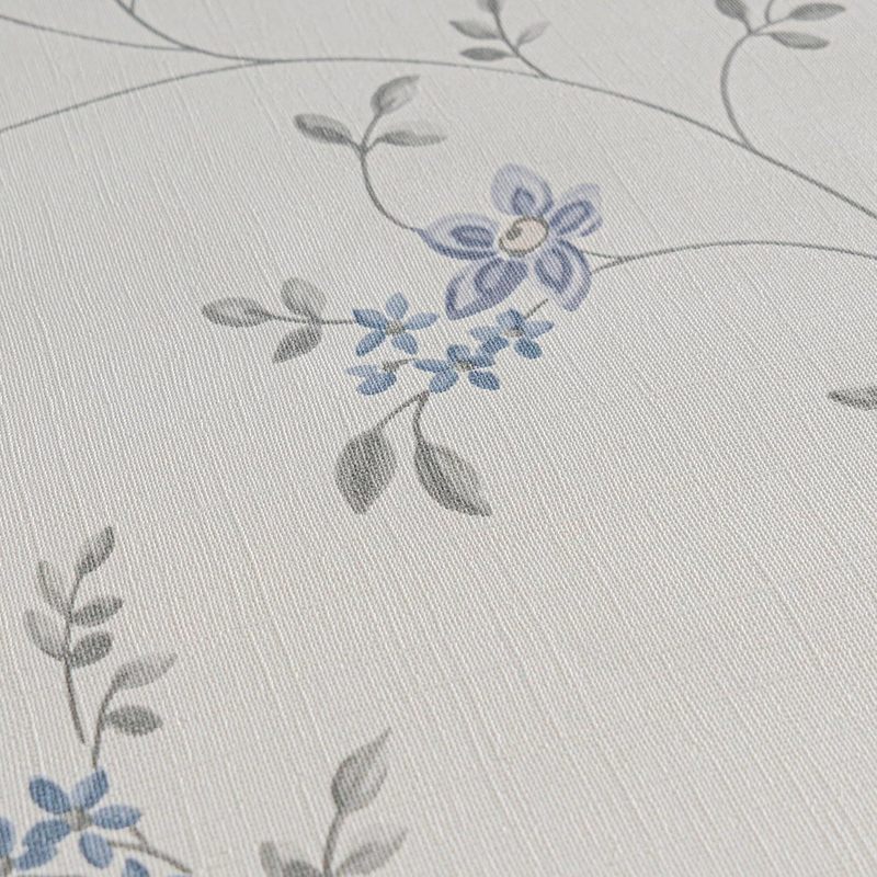 Papier peint textile à motif fleuri, gros plan sur la matière